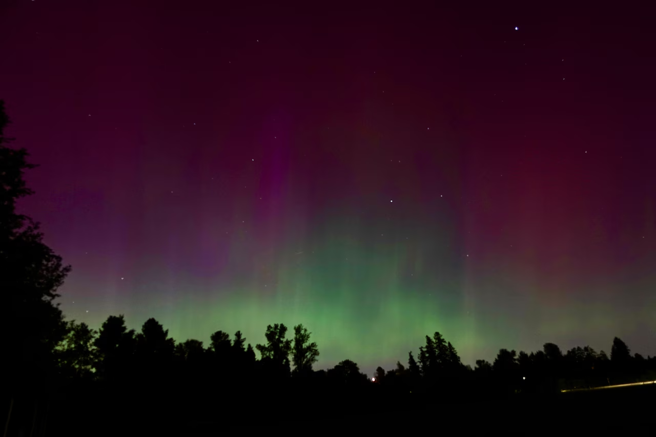 The northern lights (aurora borealis) illuminating the night sky